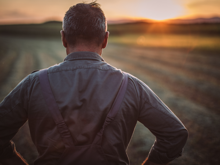 distressed farmer in field